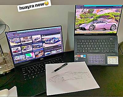 Hai màn hình mở ảnh Pagani Huayra.